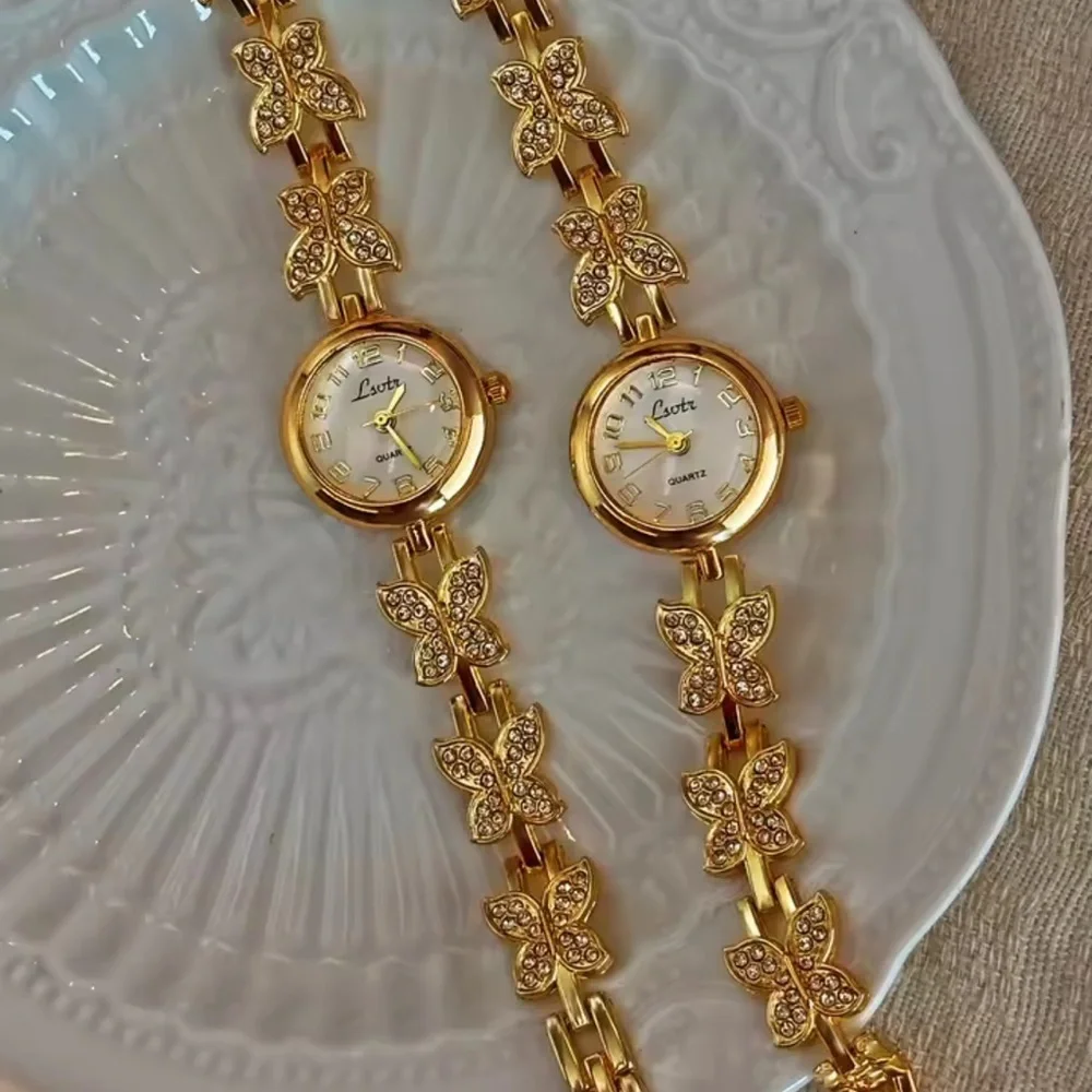 Anthropologie elegant gold